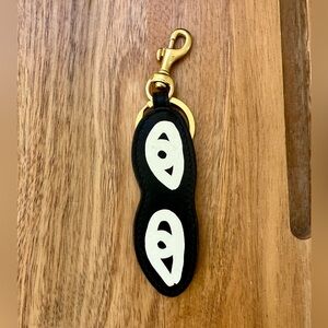 Clare V eyes keychain black and cream EUC